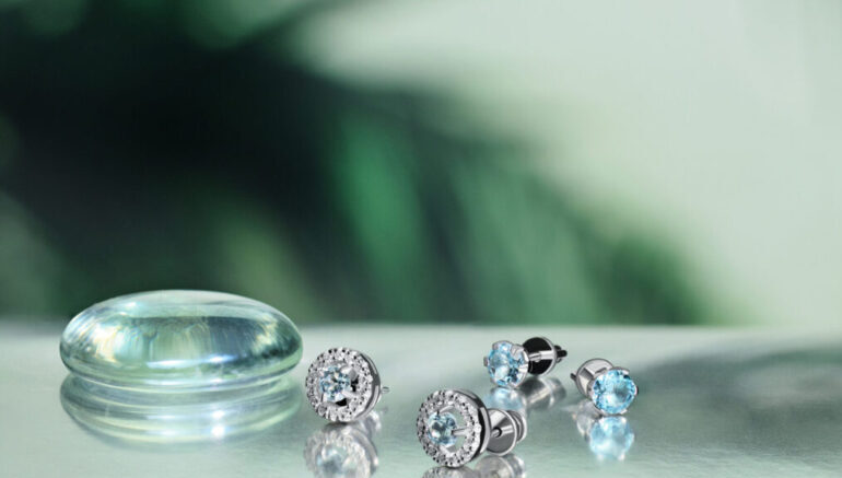 Elegant jewelry set. Jewellery set with gemstones. Product still life concept. Ring, necklace and earrings. 9 Jewelry Photography Tips for Sparkling Products